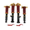 4-piece coilover strut set with red coil springs and black shock absorbers