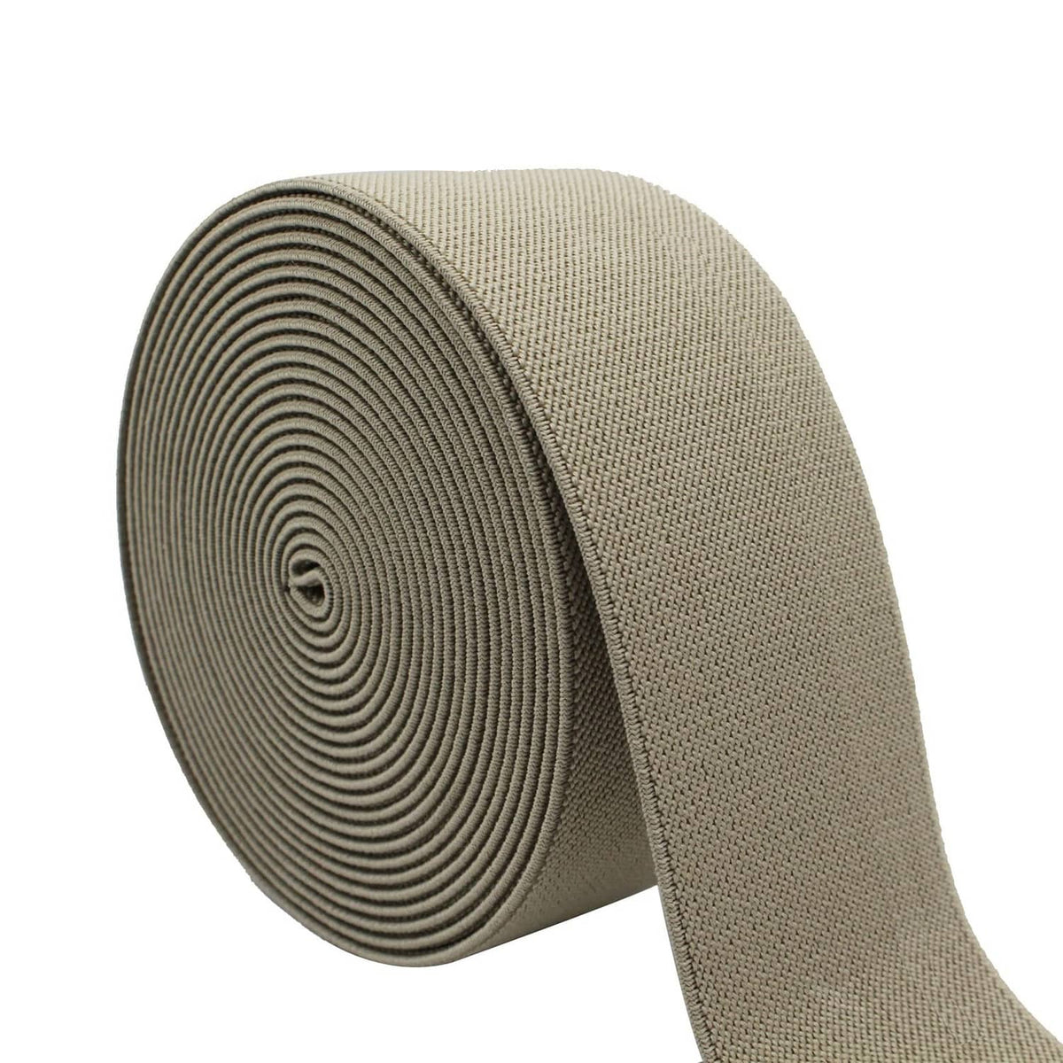 Coiled grey sewing elastic band close-up, tightly wound roll