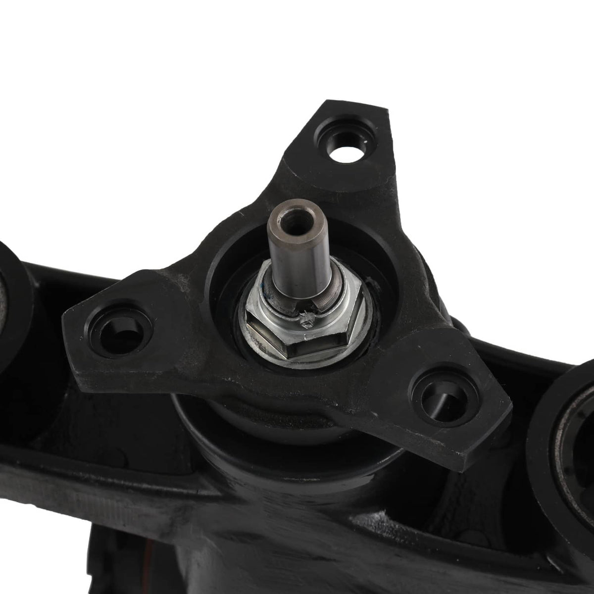 Rear differential carrier assembly close-up of mounting holes and metal shaft bushing