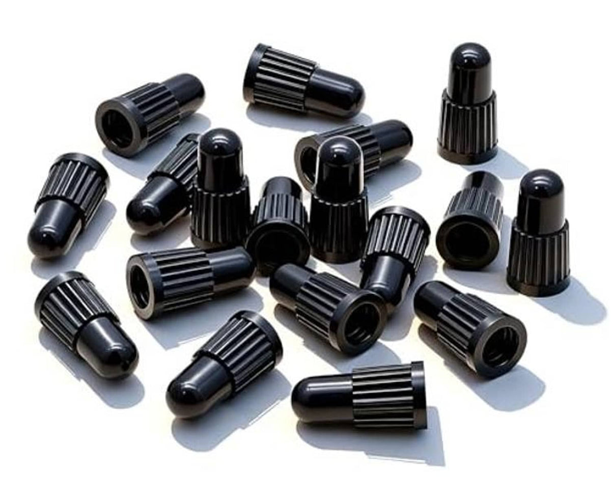 Black Presta valve caps, pack of multiple ribbed caps arranged together