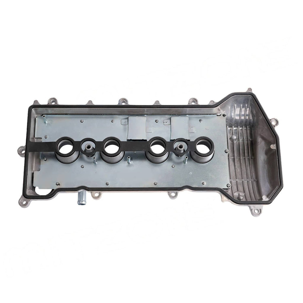 Aluminum valve cover with gasket, back/underside view with sealing grooves and ports