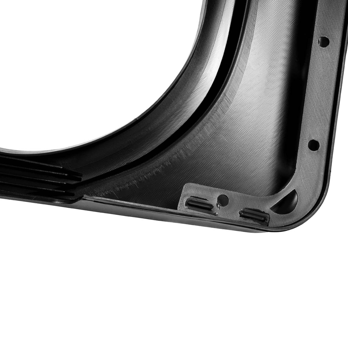 Black plastic fender liner section with textured surface and mounting points