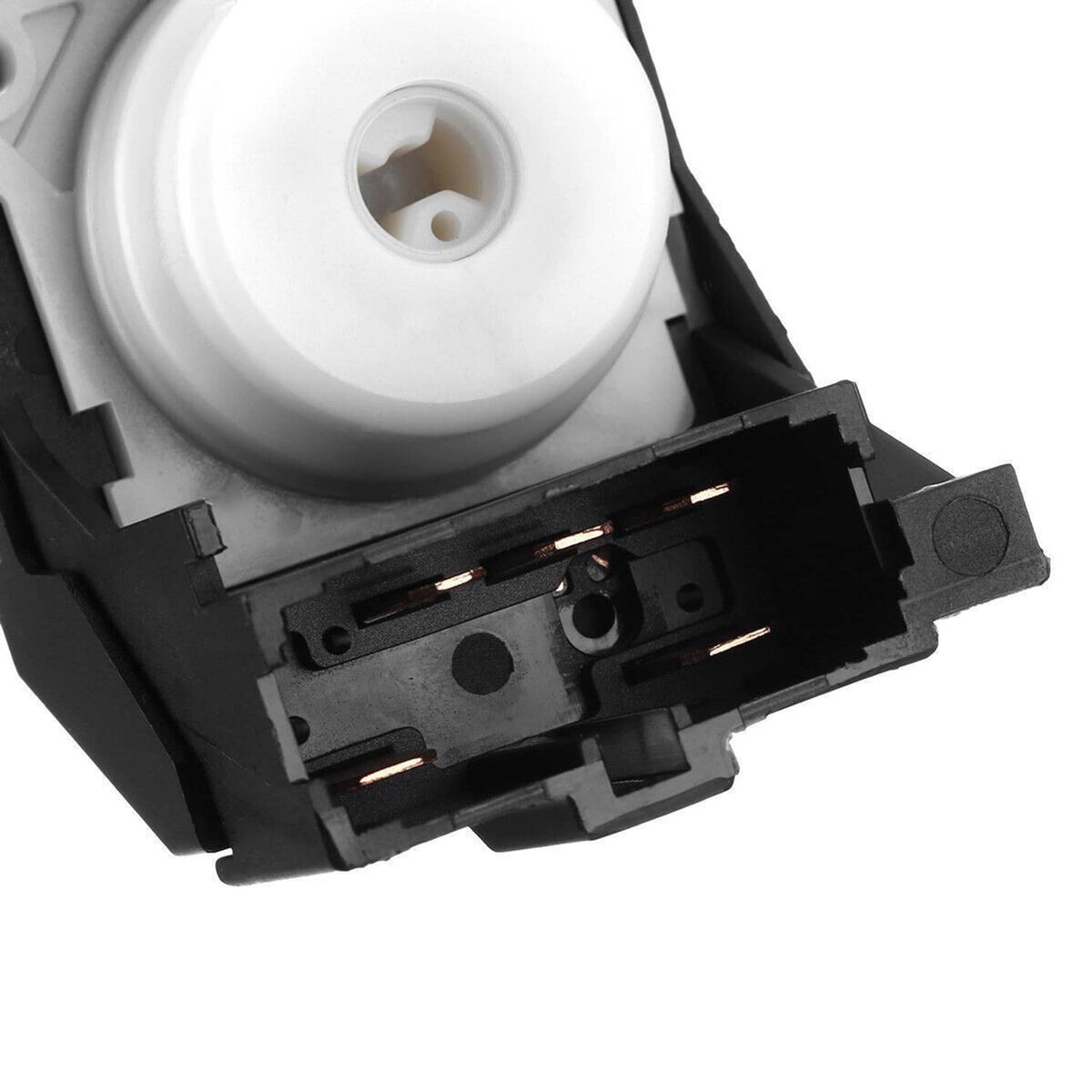 Ignition switch with white actuator and black contact plate, close-up of terminals