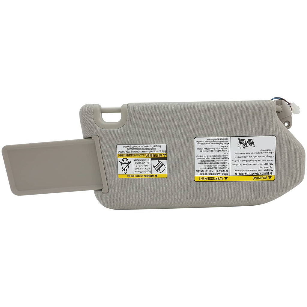 Gray left driver sun visor with vanity mirror and warning label panel