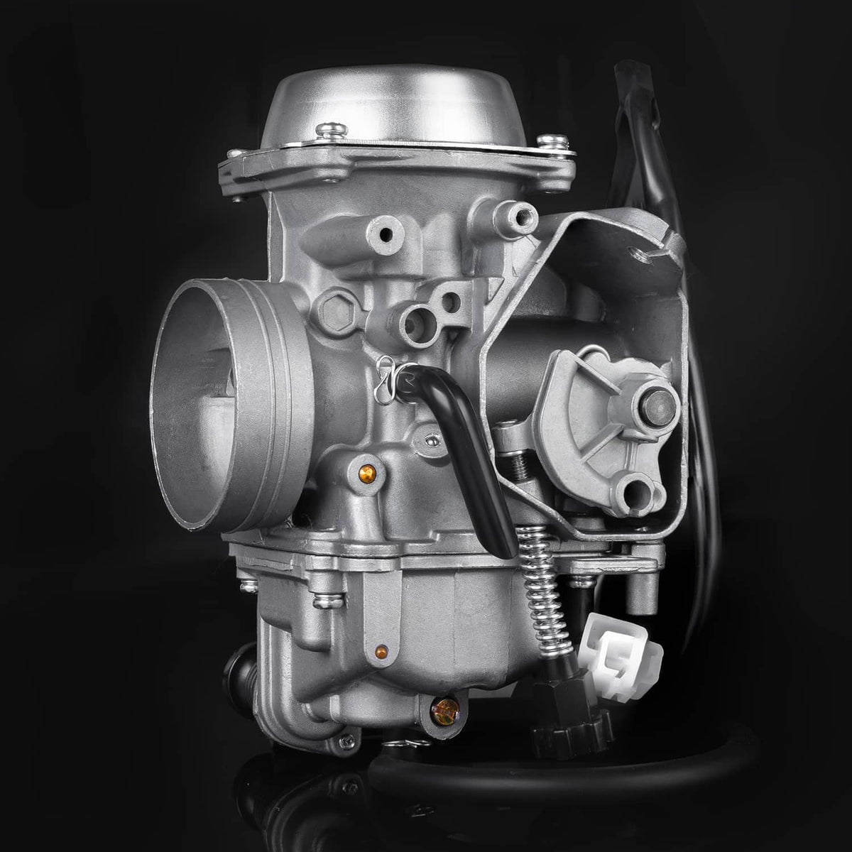 Silvery carburetor assembly with round air intake, hoses, and side-mounted control valve