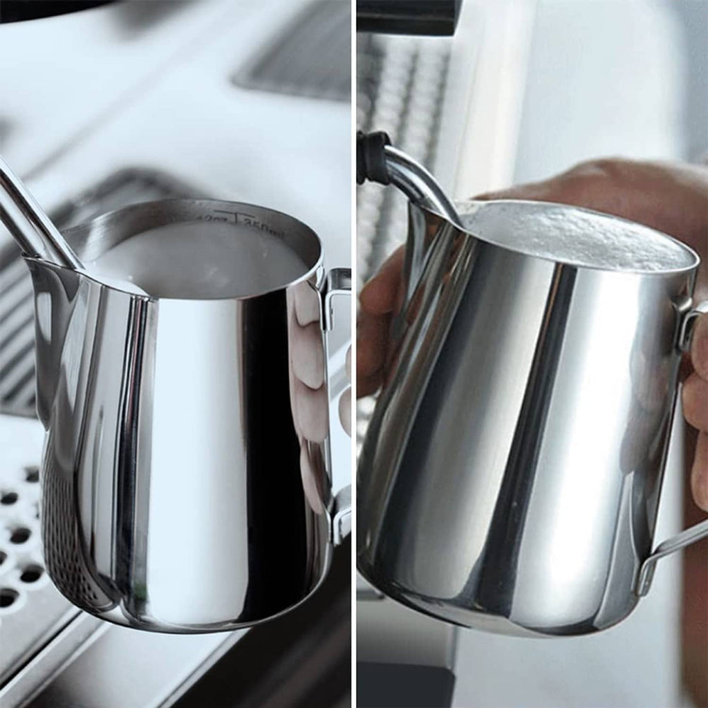 Stainless steel milk frothing pitcher on an espresso machine, showing spout and handle