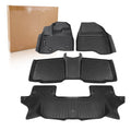 Black TPE car floor mats set with molded channels and raised nibs