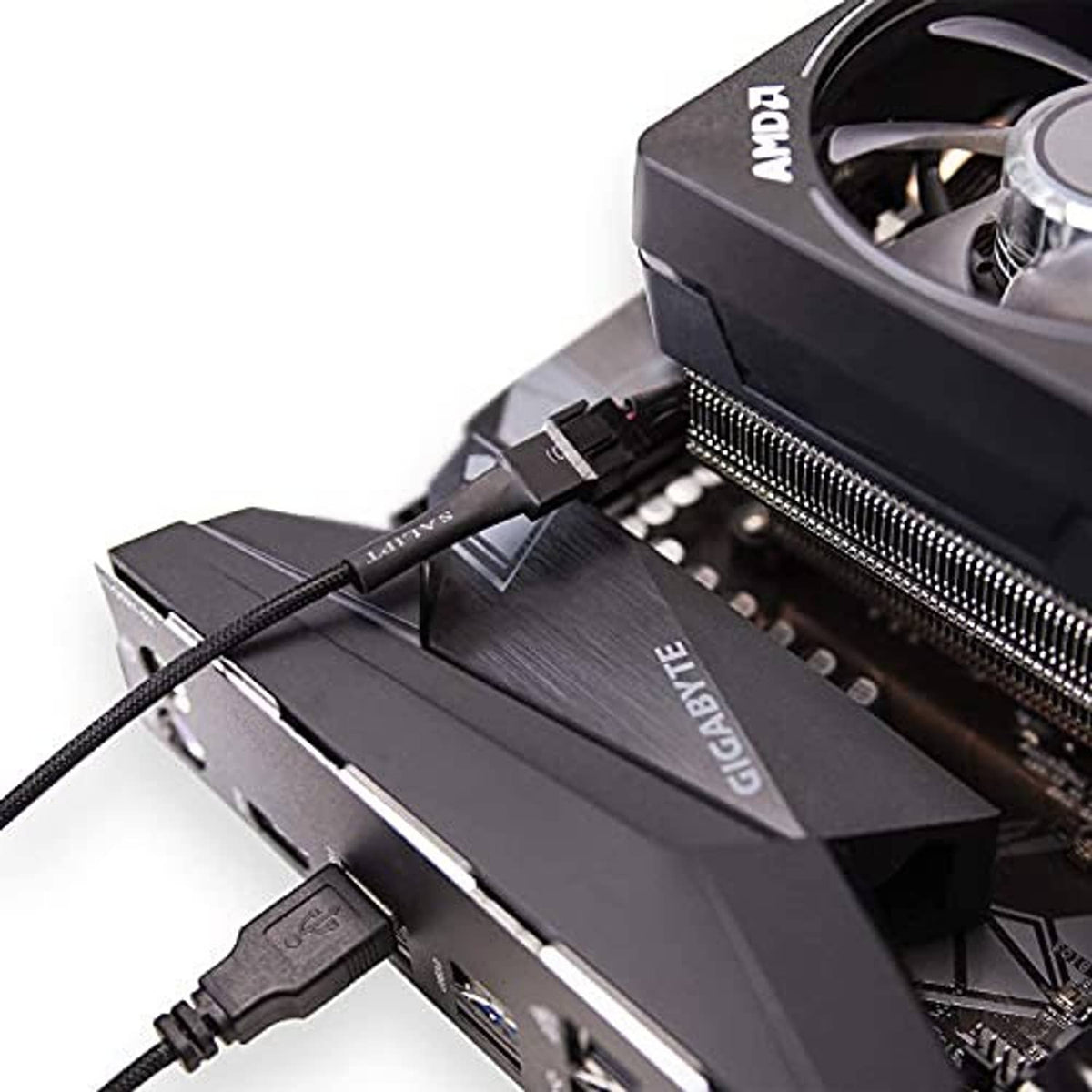 PWM fan adapter cable connected to PC fan header, black 3/4-pin plug