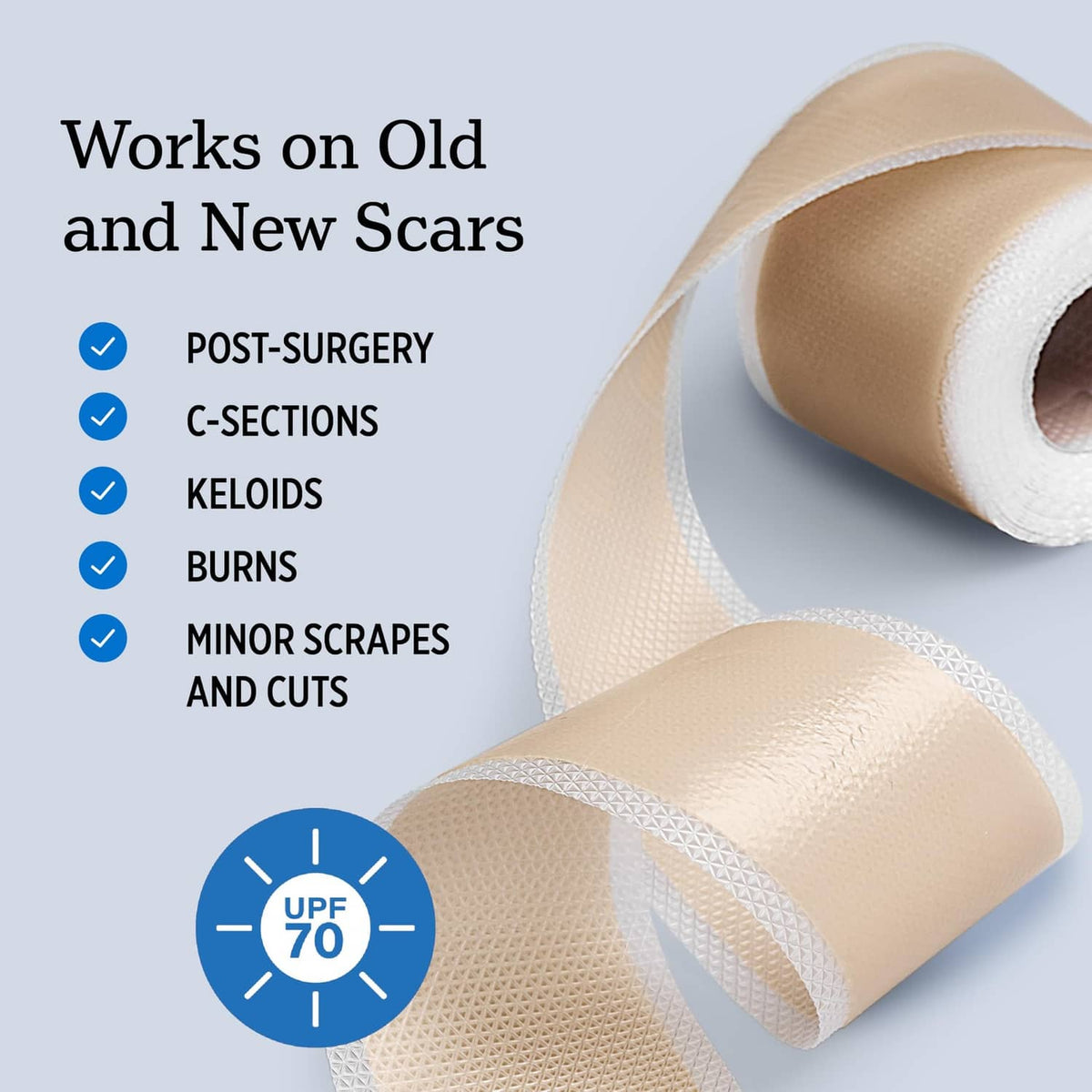 Silicone scar tape roll with tan backing and white nonstick contact layer