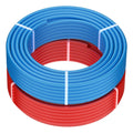 PEX-A tubing coils in blue and red with looped wrap for floor heating