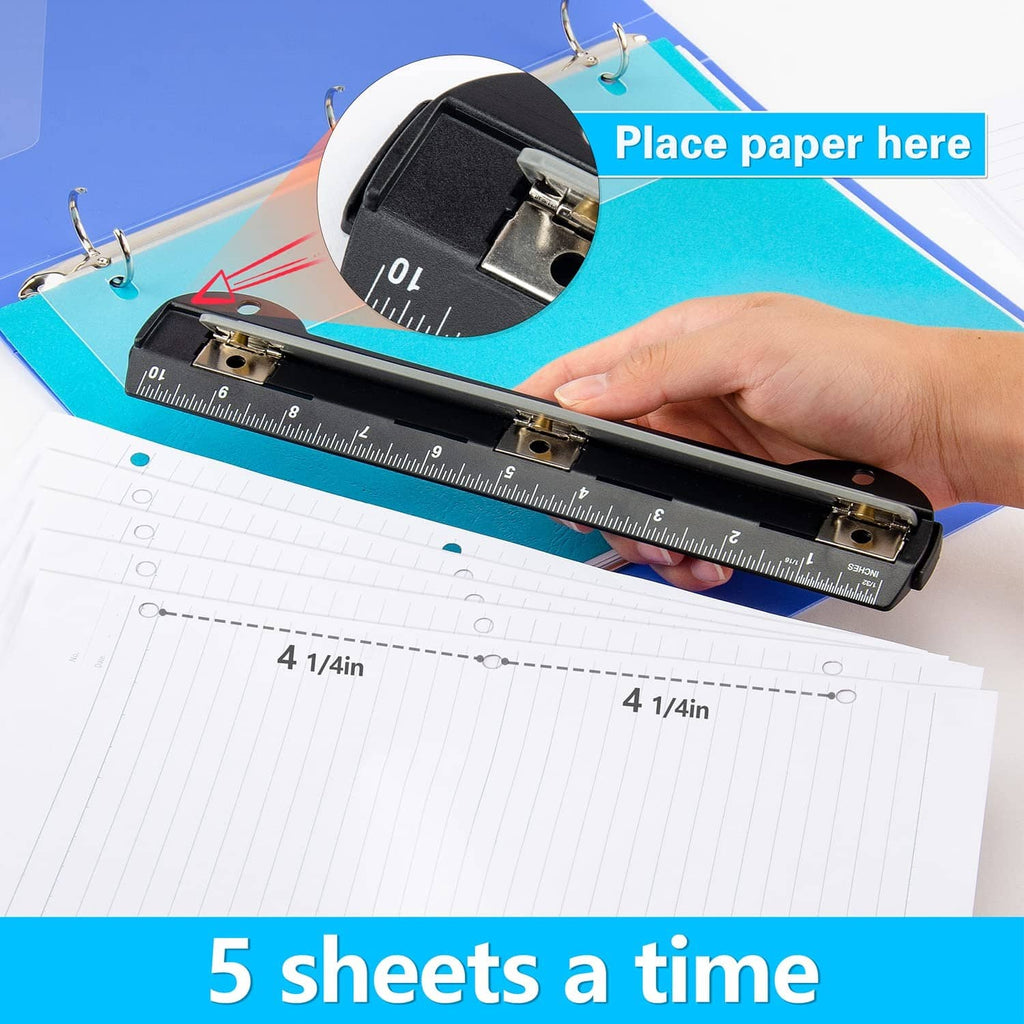 3-hole puncher with ruler guide, paper placed under the punch head by hand
