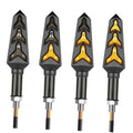 Set of 4 motorcycle LED turn signals with black housings and amber arrow indicators