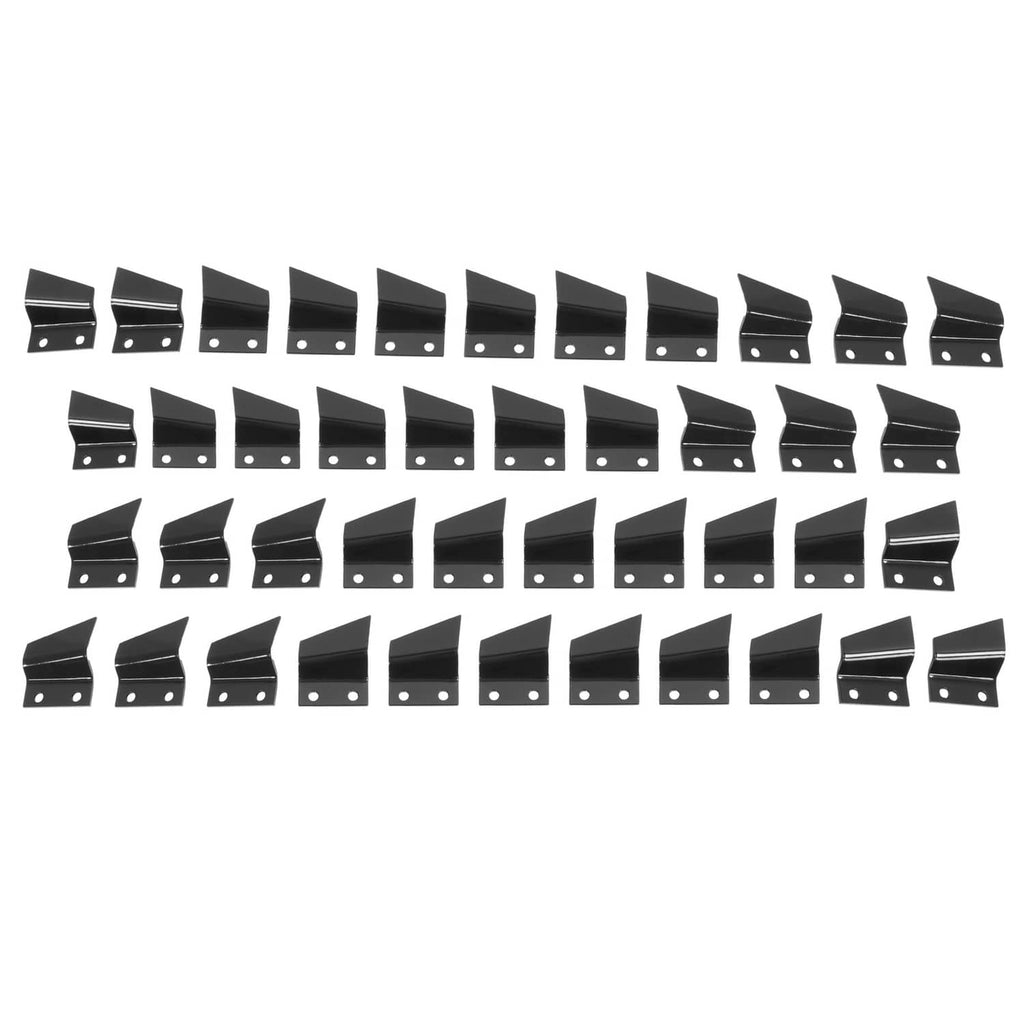 Set of black steel trencher cup teeth with mounting holes along the base