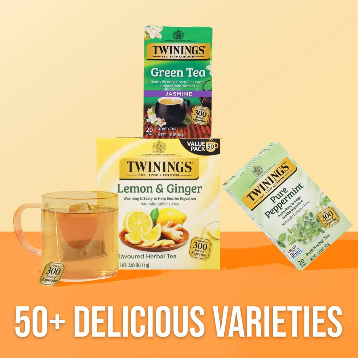 Twinings Lemon & Ginger herbal tea bags with glass mug of tea and value pack