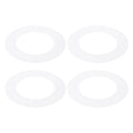 Set of translucent matte white plastic trim rings with round openings for downlights