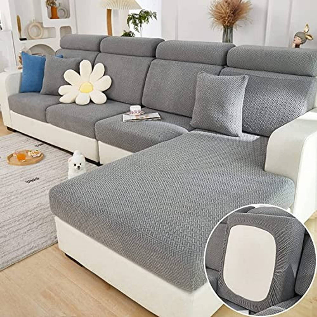 Gray textured chaise cushion cover set on sofa seat cushion with back support piece