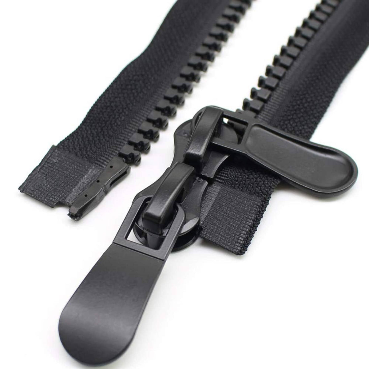 Black two-way separating zipper with dual sliders and connected pull tabs