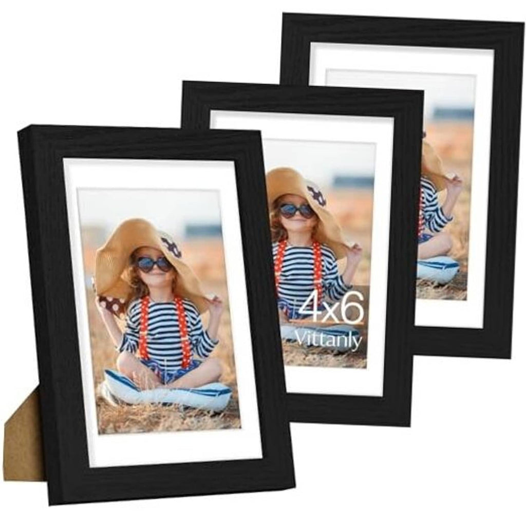 Set of 3 black picture frames with white mats and photo inserts, overlapping front views
