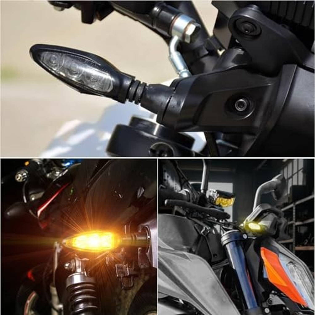 LED motorcycle turn signal mounted on handlebars, clear lens showing amber light
