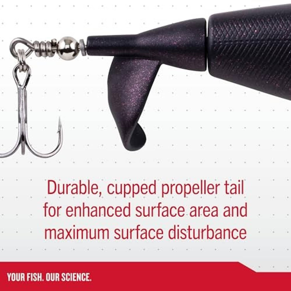 Topwater lure close-up with dark textured body and cupped propeller tail