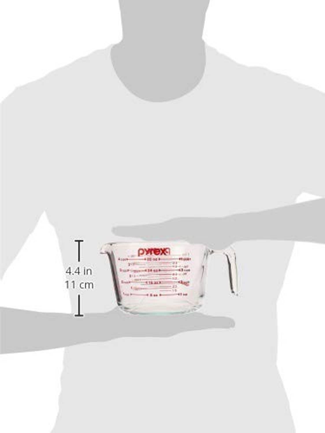 Pyrex glass measuring cup 4 cups (32 oz), shown with hand and height 4.4 in