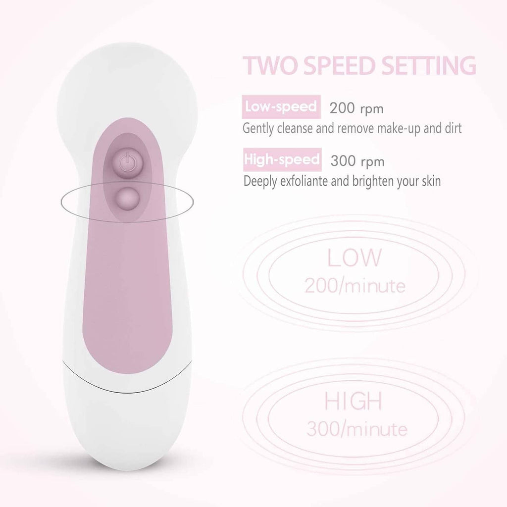 Facial cleansing spin brush with purple brush head area, front view