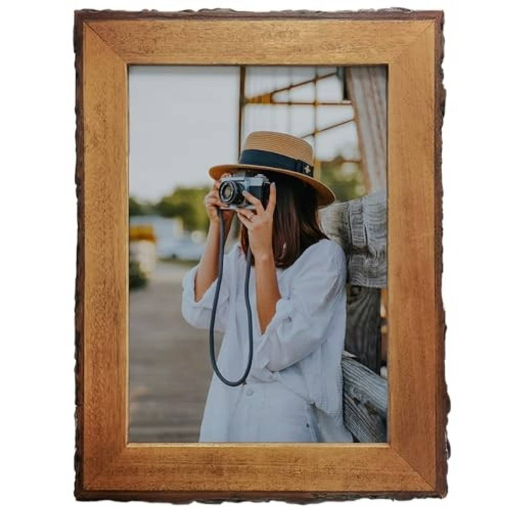 Rustic live-edge wood picture frame with brown finish and photo-ready glass front