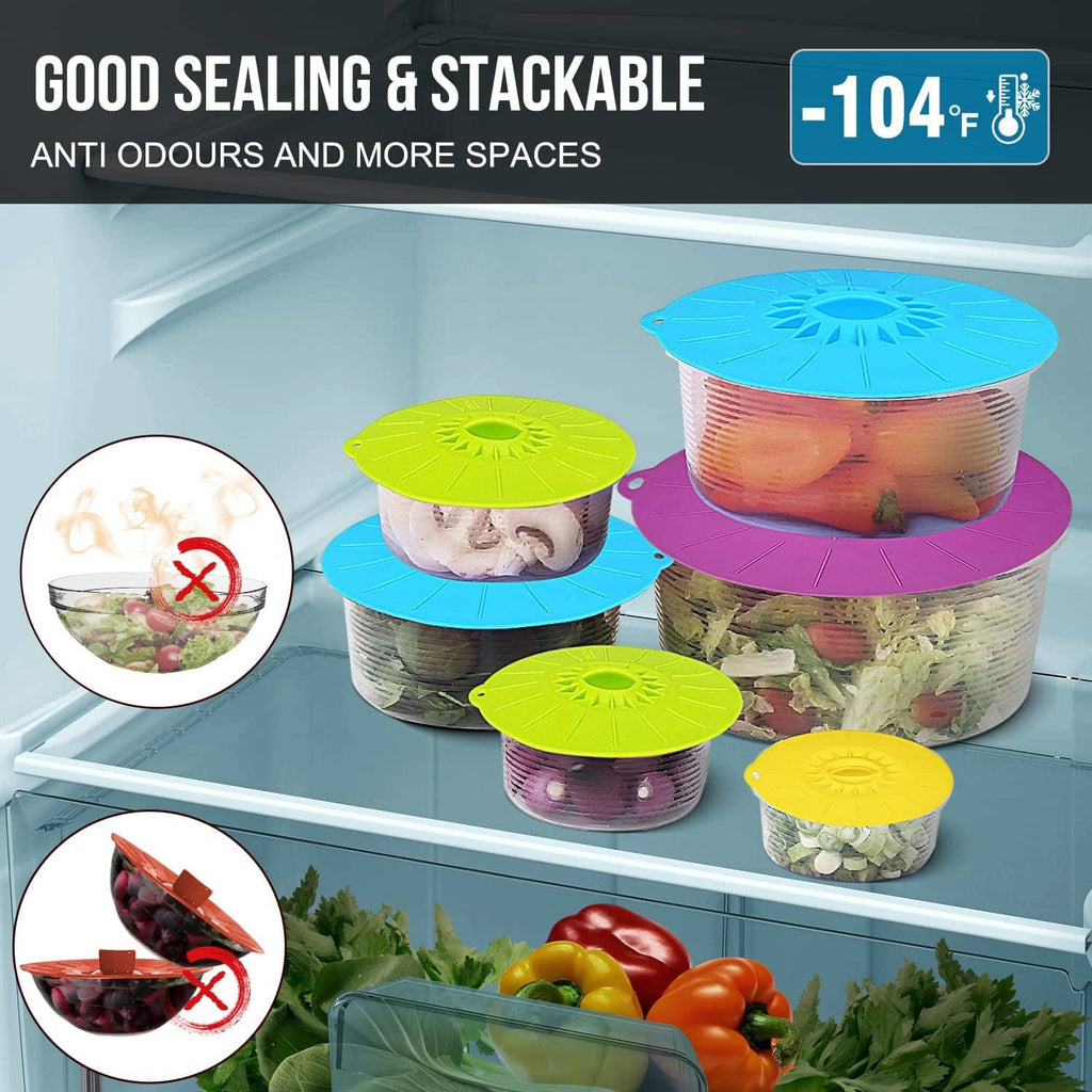 Stackable silicone food lids in blue, green, purple, and yellow for covered meal storage