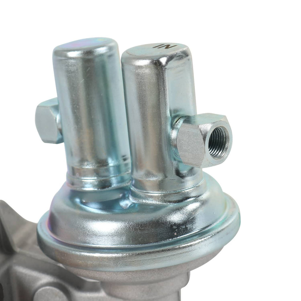 Fuel lift transfer pump close-up with two chrome posts and threaded outlet fitting on base