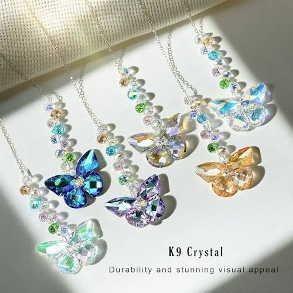 Set of crystal butterfly suncatchers with rainbow faceted butterfly charms on silver chains