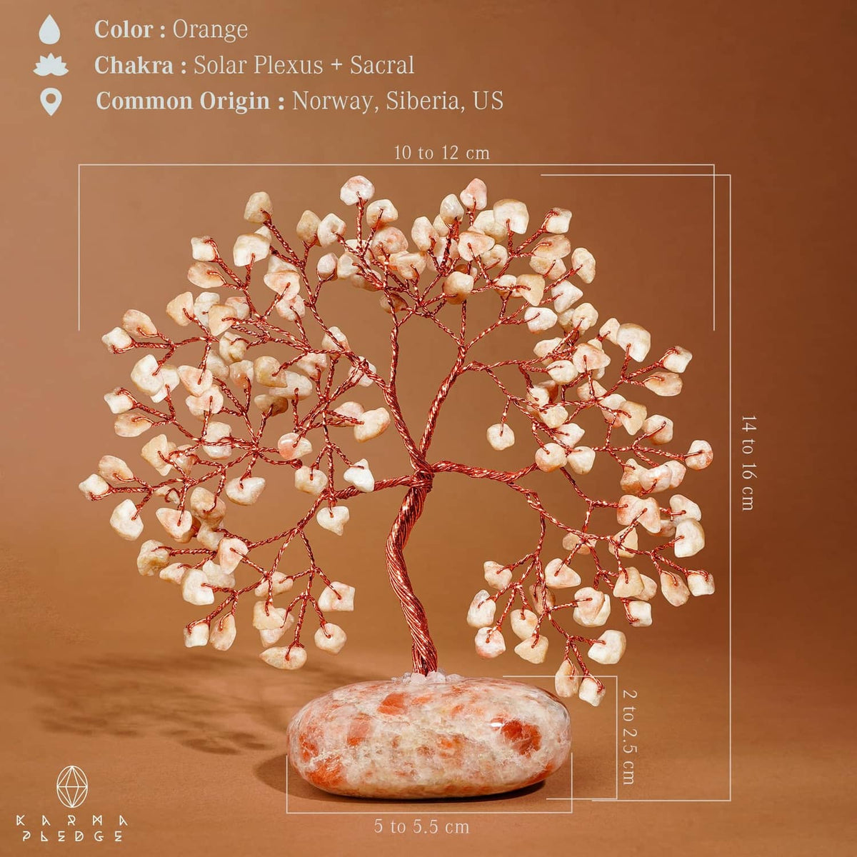 Sunstone crystal tree ornament with red wire branches and oval orange-pink base
