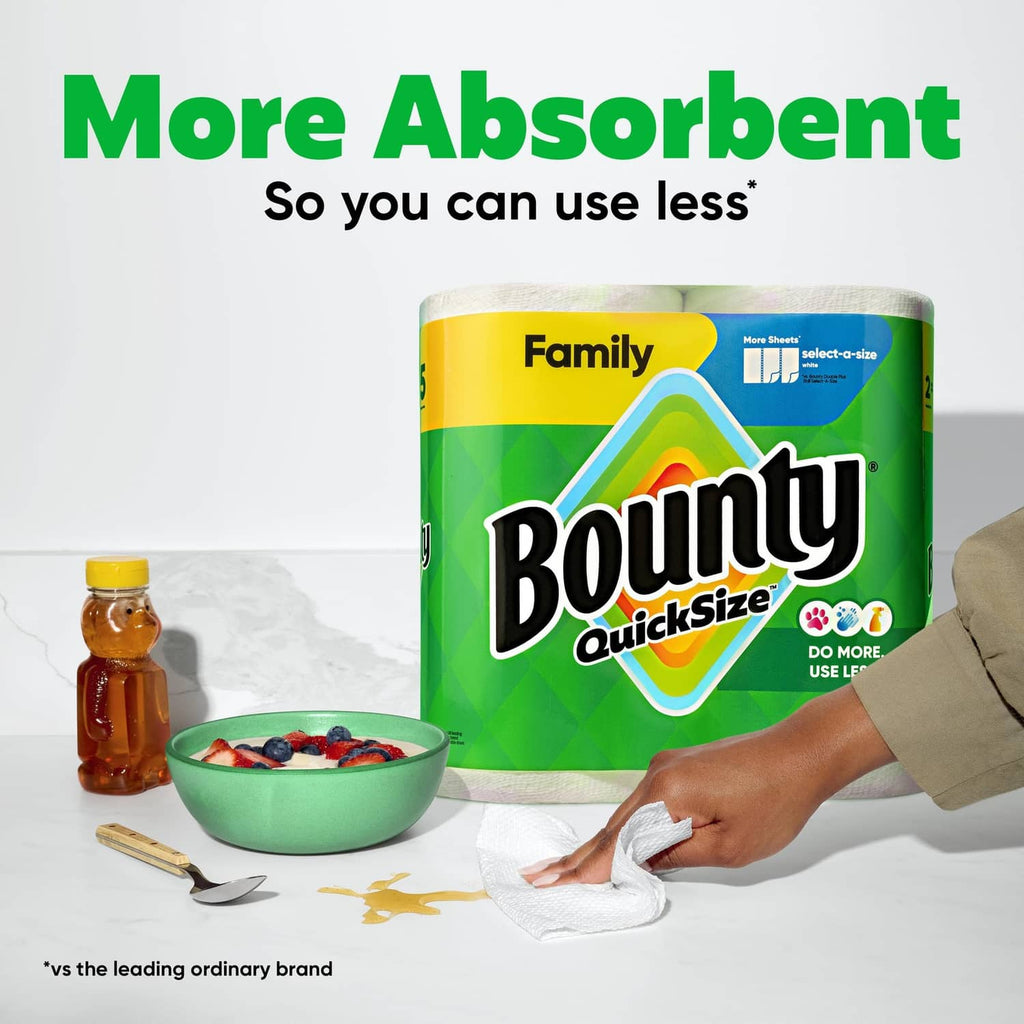 Bounty Quick Size paper towel roll pack and hand wiping with a white sheet