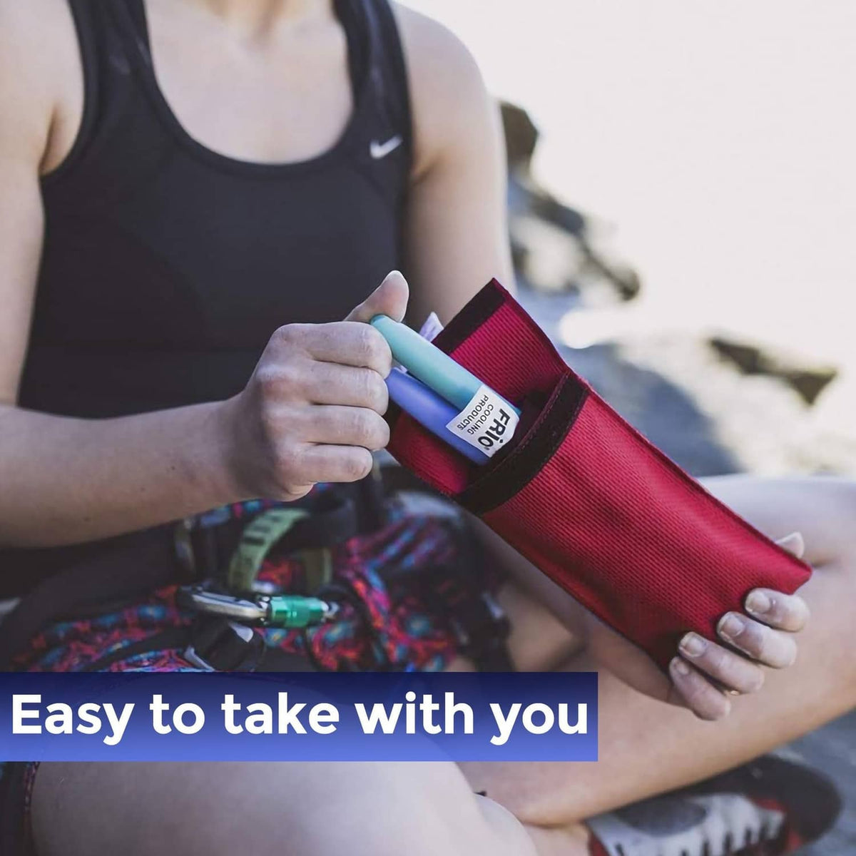 Red FRIO cooling wallet holding a blue cartridge inside the outer sleeve