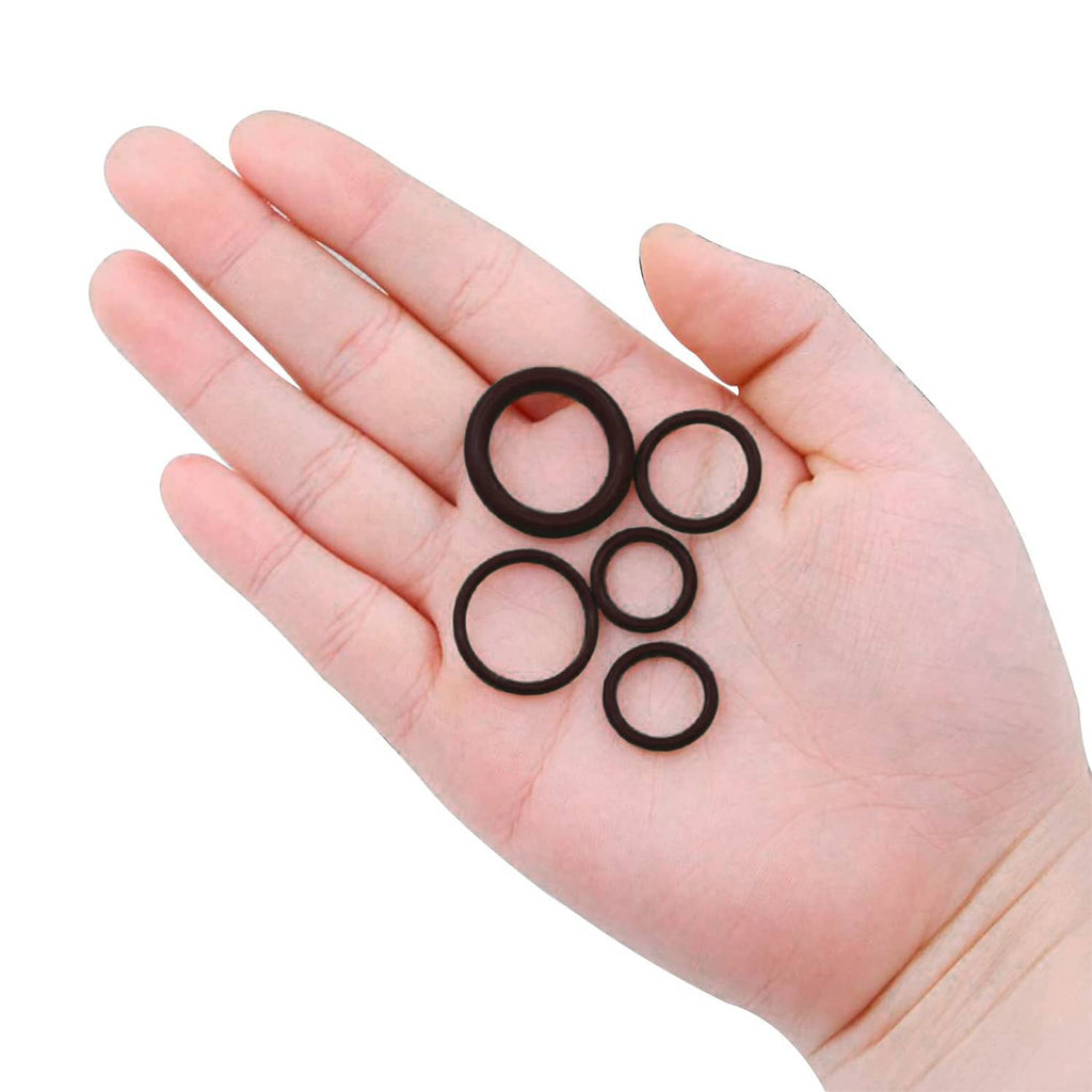 Black rubber O-rings in an open palm, round seal rings