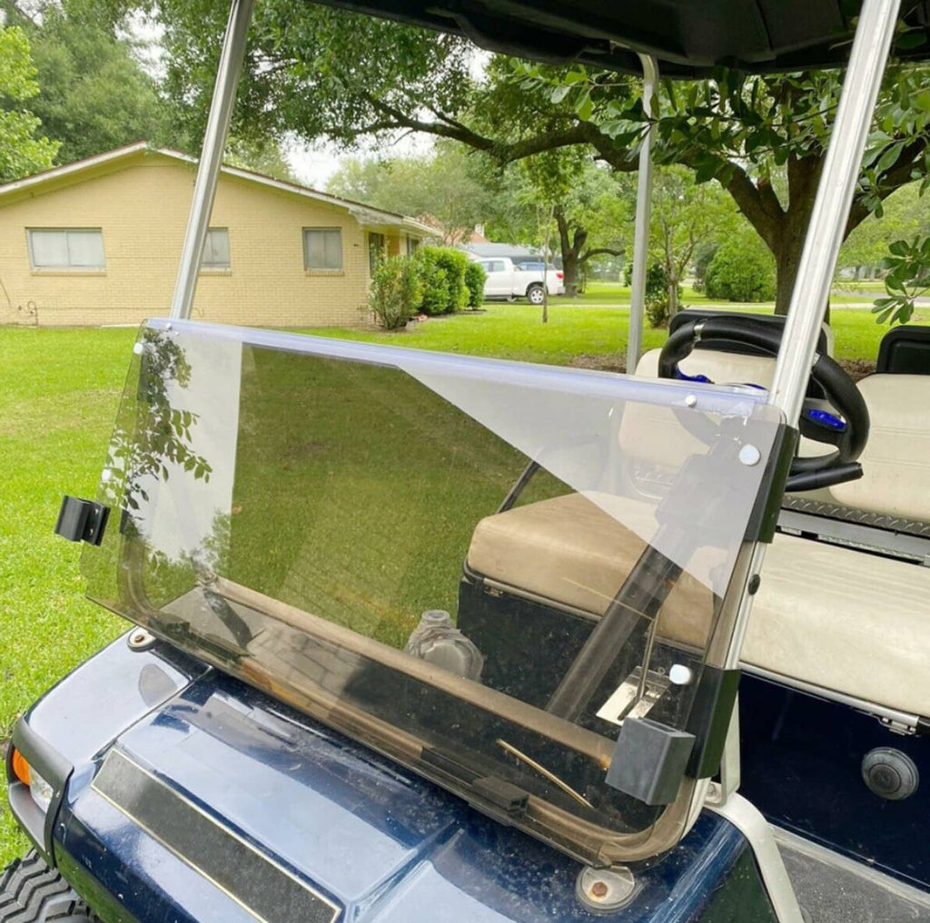 Installed tinted windshield windscreen on a golf cart with metal side support posts