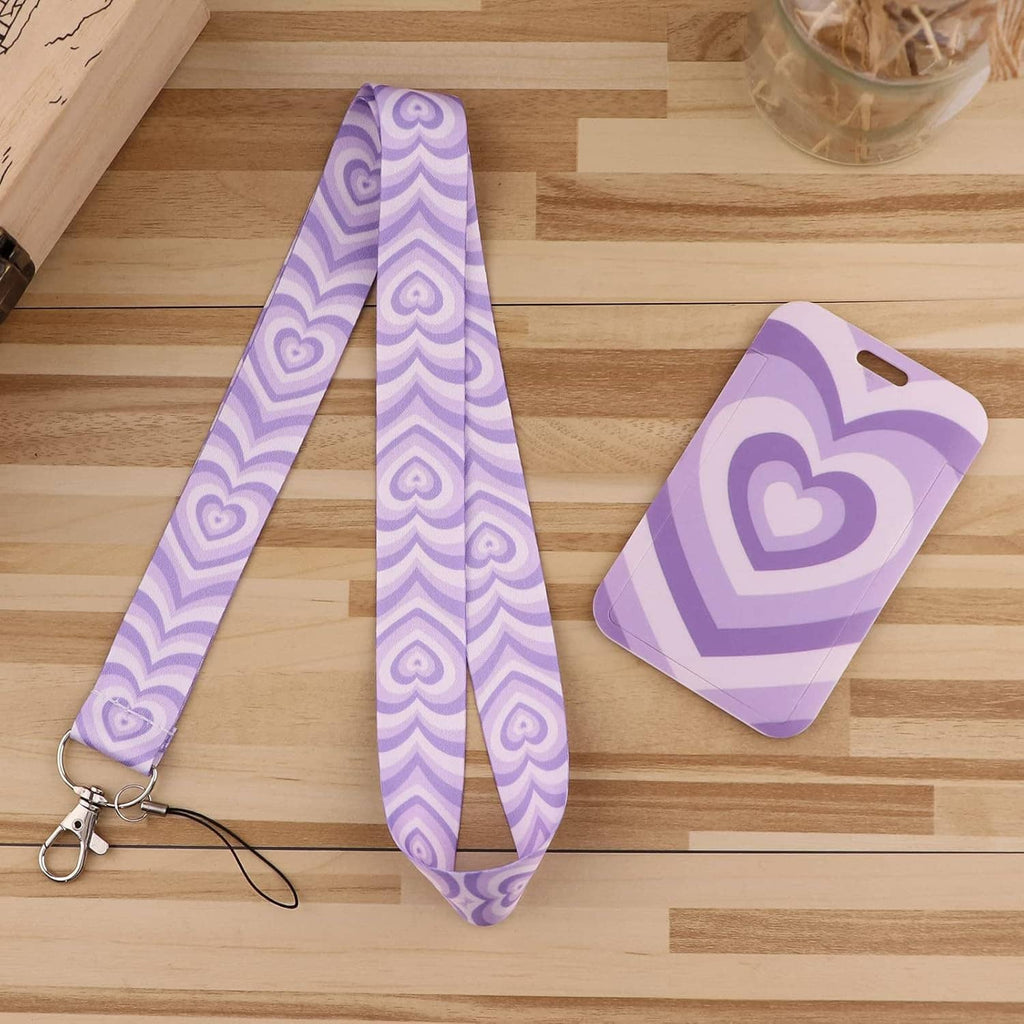 Purple heart-pattern lanyard with attached ID badge holder card, heart design