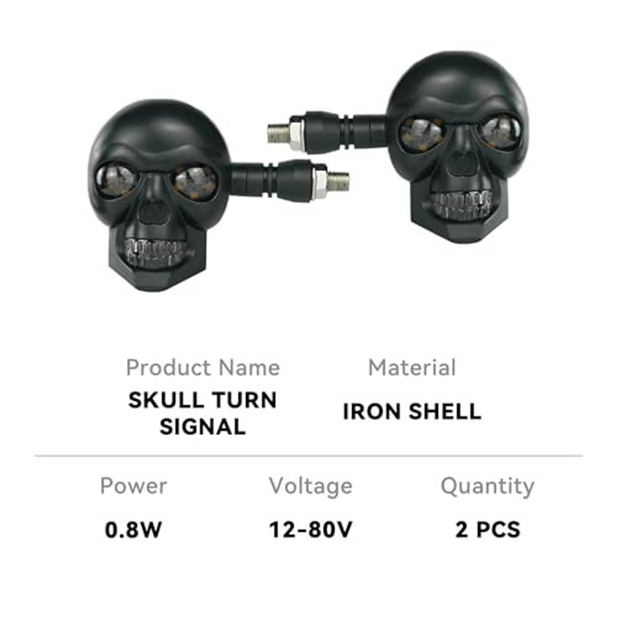 Two skull turn signal lights with metal housing, shown from front and side