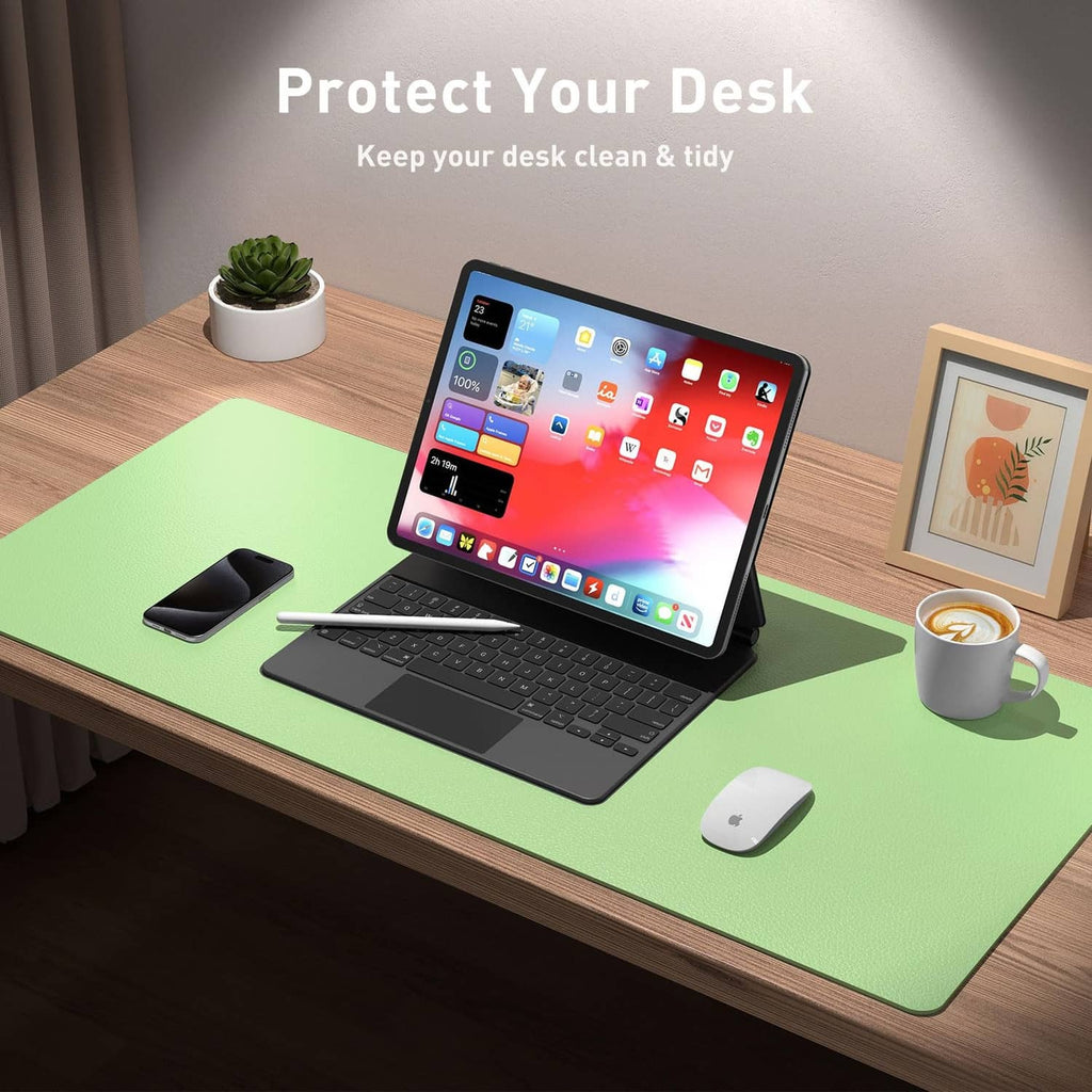 Foam green leather desk pad on office desk with laptop and mouse