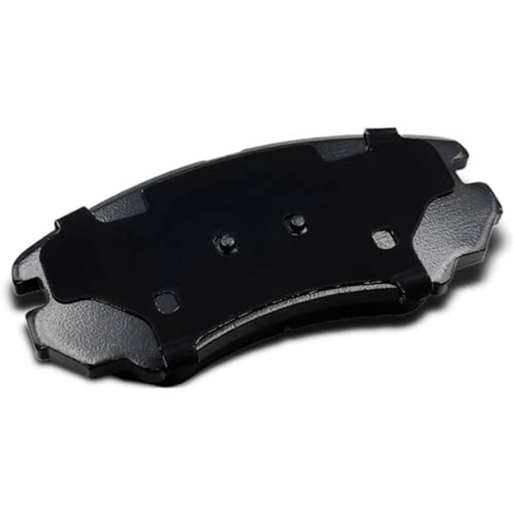 Ceramic brake pad with black backing and mounting hardware, side view