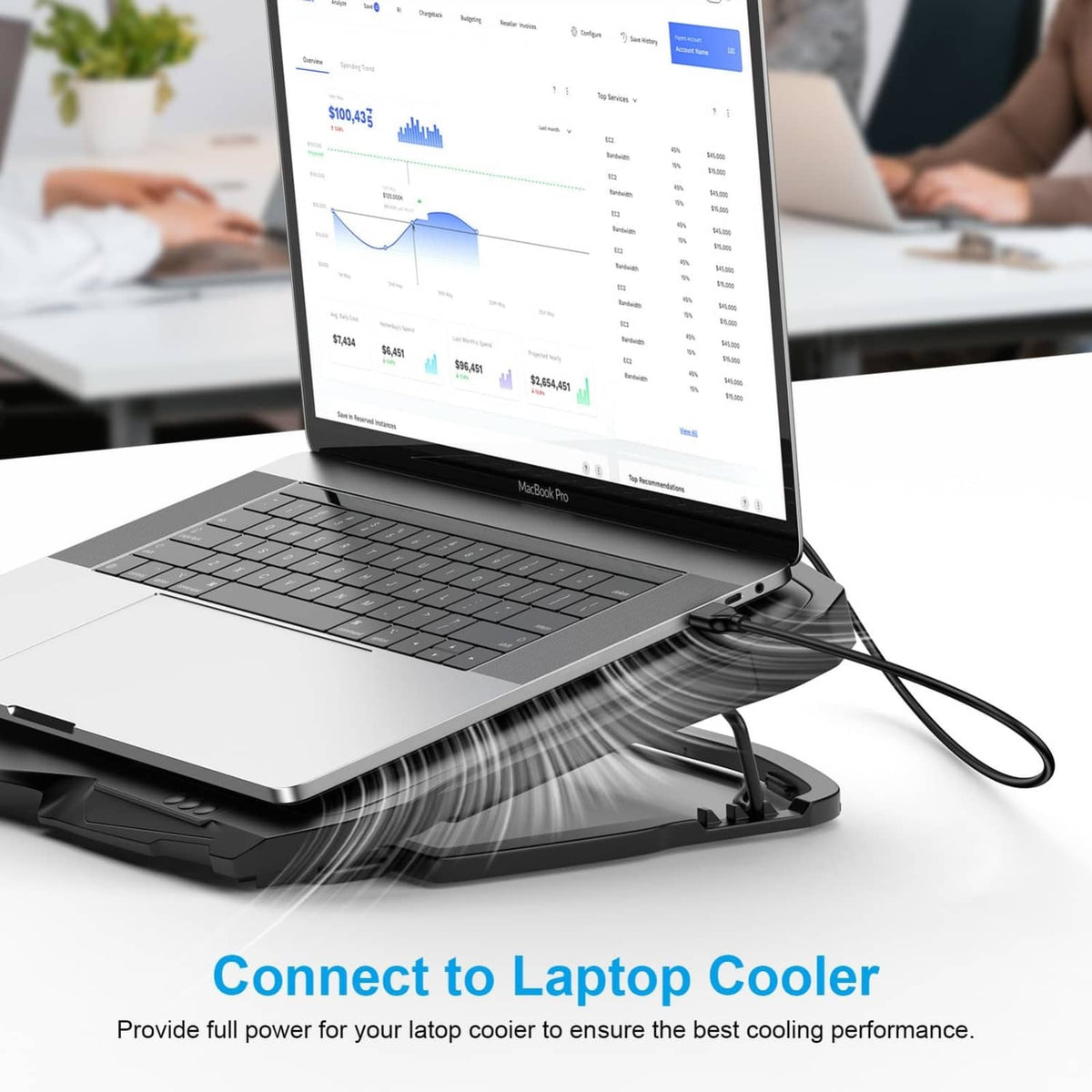 Black USB-A male to male braided cable plugged into a laptop