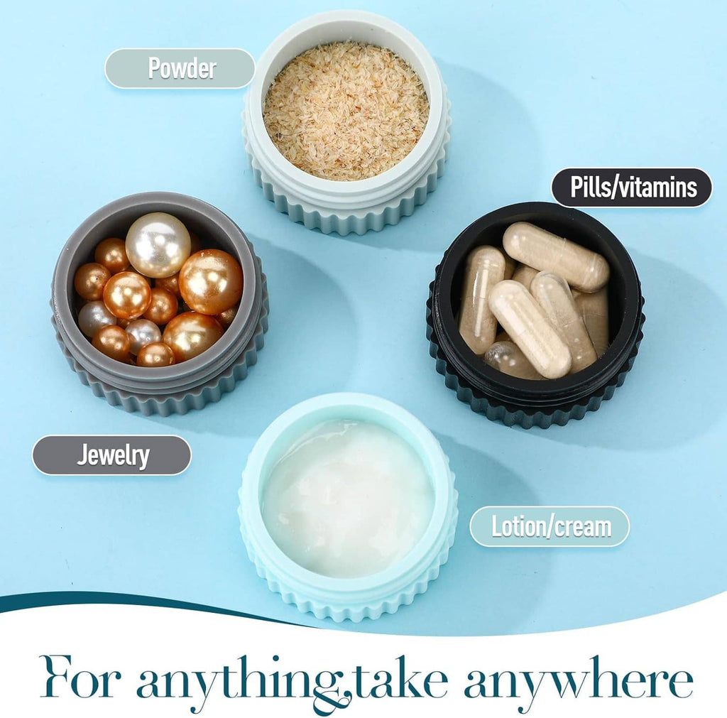 Small silicone travel jars holding powder, pills, jewelry, and lotion/cream, color-coded