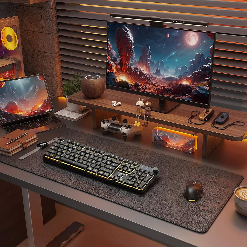 Redragon K521 Pro wireless gaming keyboard on a desk with multicolor RGB keys
