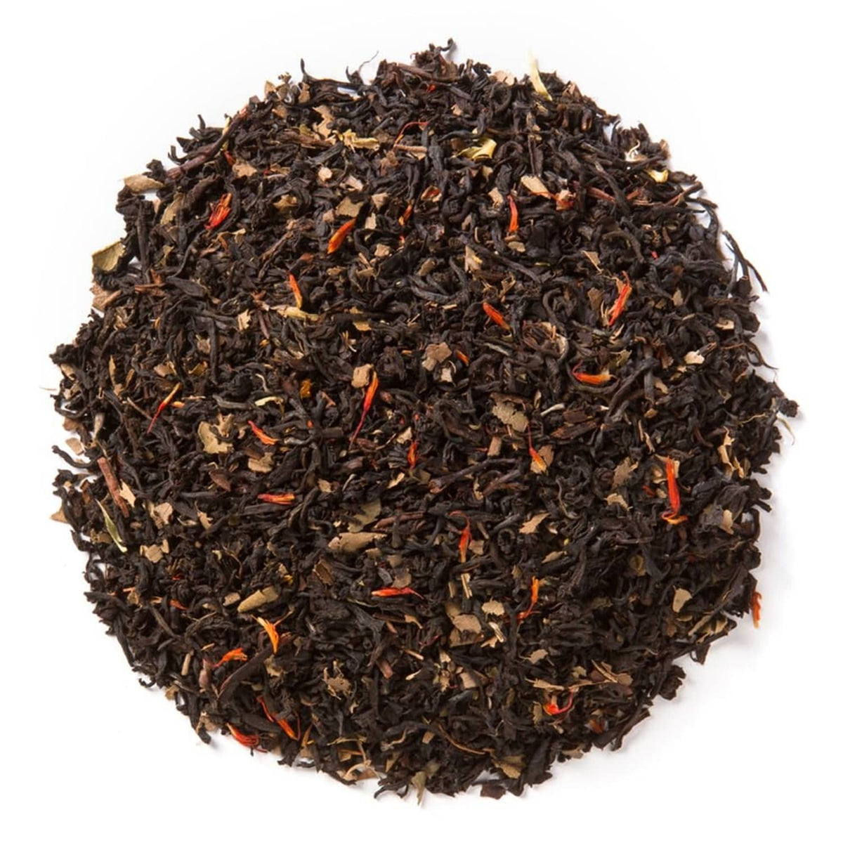 Loose leaf organic black tea in a heap with small orange and brown pieces
