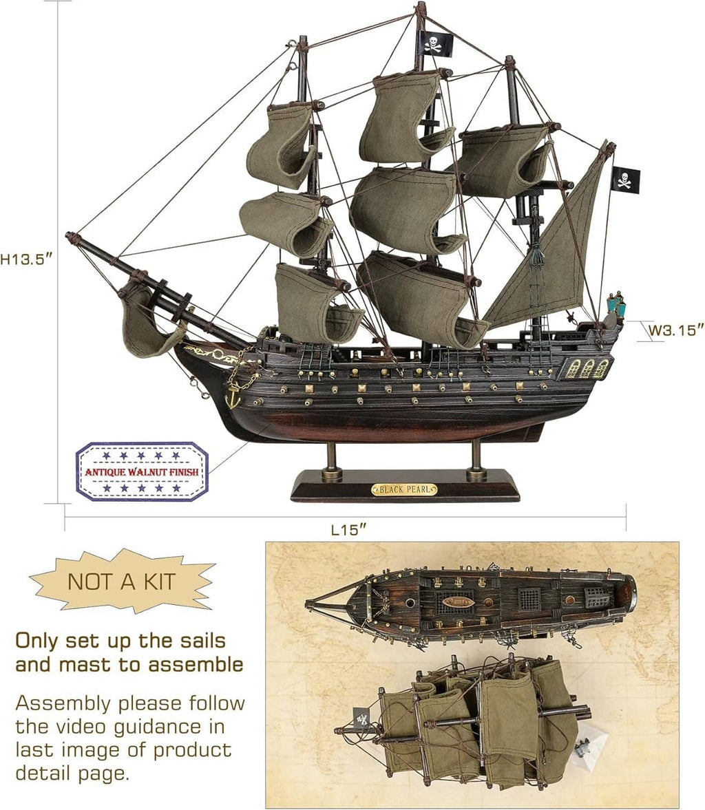 Wooden pirate ship model with dark hull, olive sail canvas, and “Black Pearl” nameplate on base