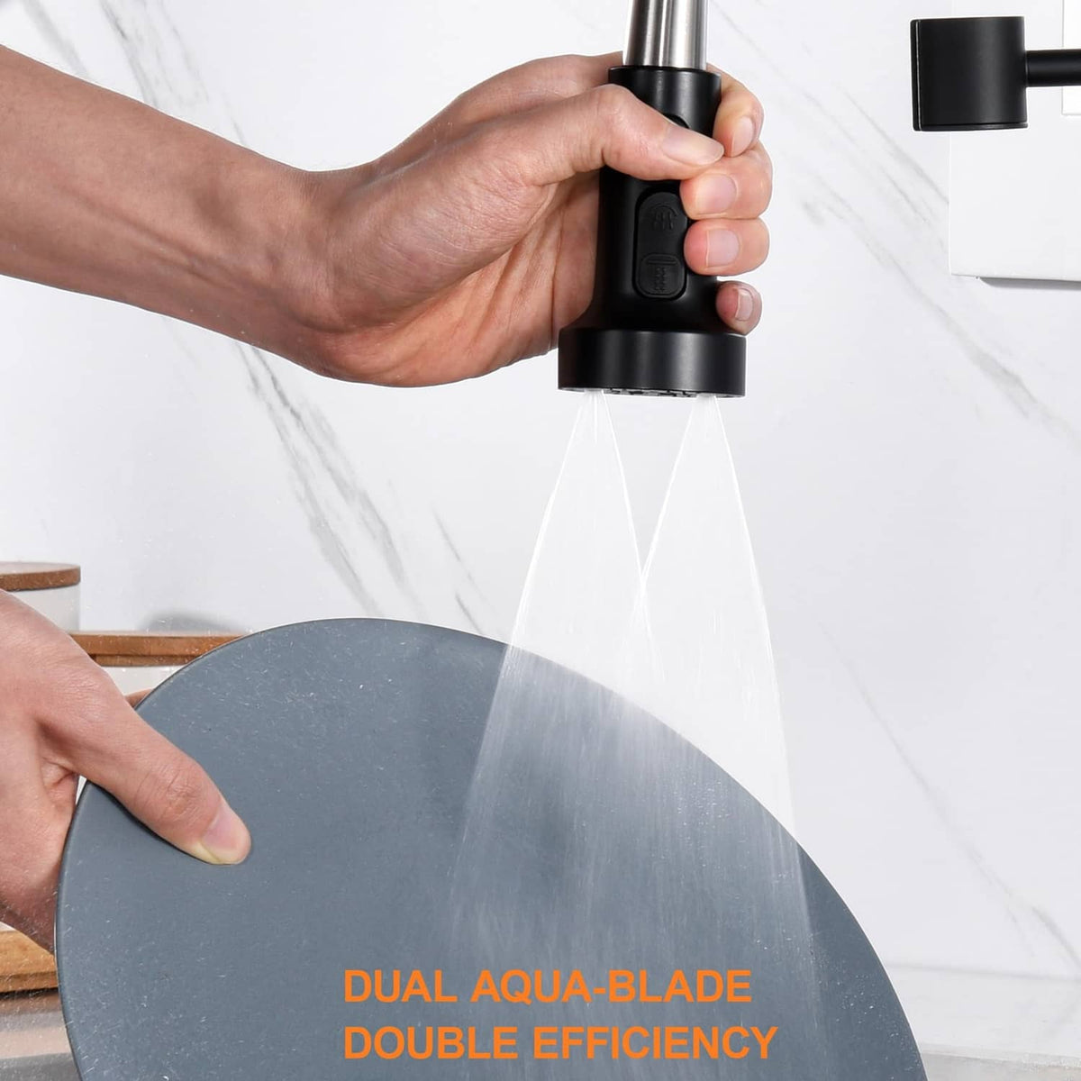 Matte black faucet head held in hand with water spray; dual aqua-blade effect shown