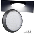 Black round LED dome light with textured bezel and clear lens, glowing white
