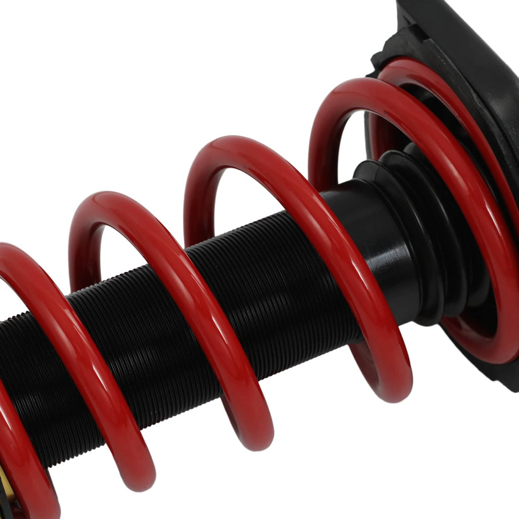 Close-up of red coil springs around black shock housing