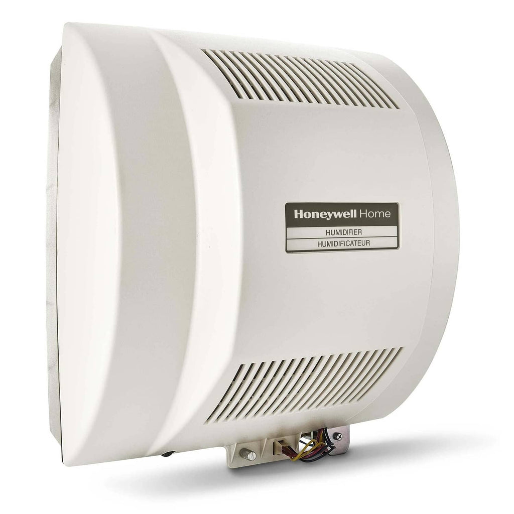 Whole-home humidifier side view with vented grille and Honeywell Home label