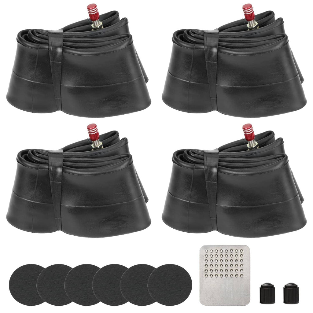 Four black dirt bike inner tubes with red valve caps, round patches, and spare caps