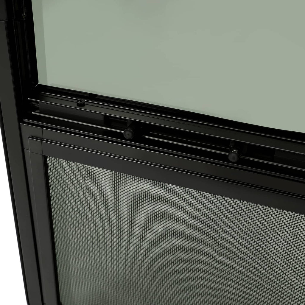 Tinted RV window installed in black trim, with upper tinted glass and lower screen